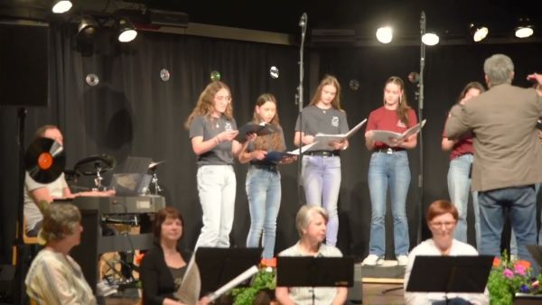 2 improvoices sign of the times